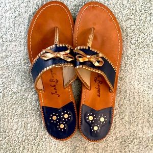 Navy/gold bow accent size 11 sandals in great condition.